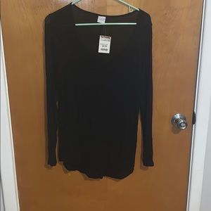 Long sleeve black shirt with low cut neck